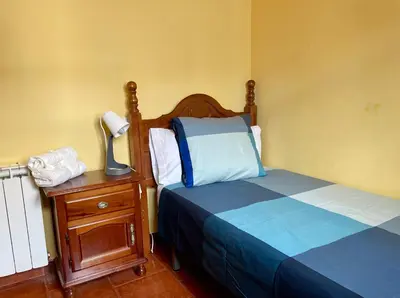 Cama o camas de una habitación en Luna de Gredos - Dormitorios con baño en suite