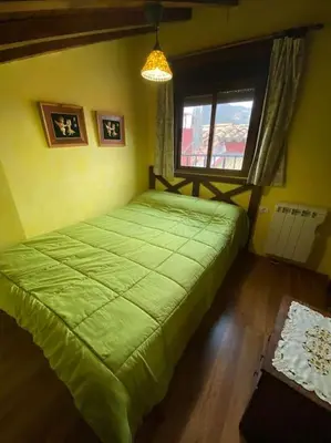 Cama o camas de una habitación en La herradura, acogedora casa en Montemayor del Río