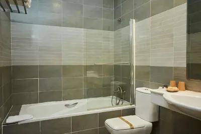 Un baño de Hotel El Mirlo Blanco