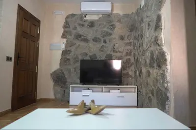 Una televisión o centro de entretenimiento en Casa del Caño