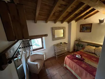 Cama o camas de una habitación en La Candileja