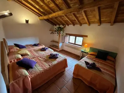 Cama o camas de una habitación en La Candileja