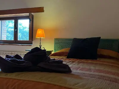 Cama o camas de una habitación en La Candileja