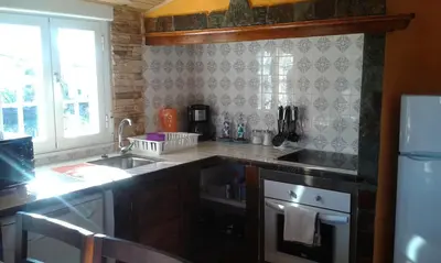 Una cocina o zona de cocina en Apartamento El Dragon Serrano