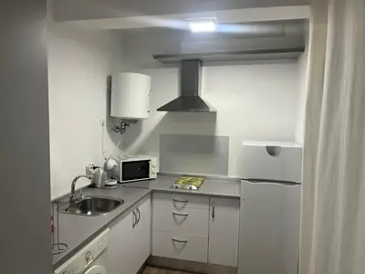 Una cocina o zona de cocina en Apartamentos La Encomienda 2 Llaves