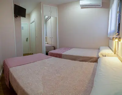 Cama o camas de una habitación en ALOJAMIENTOS TAJO INTERNACIONAL