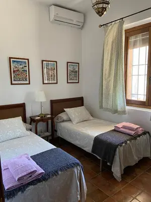 Cama o camas de una habitación en Casa Rural La Joyona