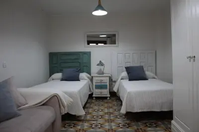 Cama o camas de una habitación en La casa de mis suegros