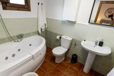 Un baño de Apartamentos Rurales la Campiña