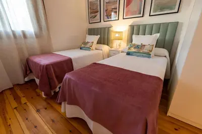 Cama o camas de una habitación en Apartamentos Rurales la Campiña