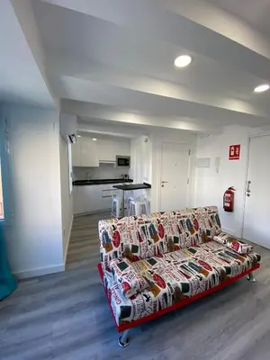Una cocina o zona de cocina en Apartamentos San Martín