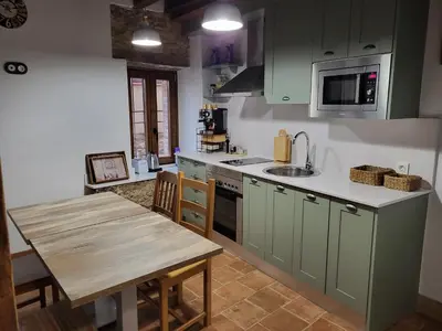 Una cocina o zona de cocina en Casa Rural: La casa El cura
