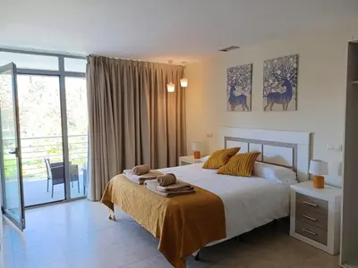 Cama o camas de una habitación en La Alameda Jardines del Prado -Amplio y con ascensor-