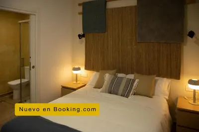 Cama o camas de una habitación en HOTEL LOS ALAMOS BOUTIQUE