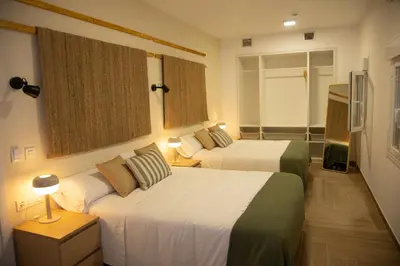 Cama o camas de una habitación en HOTEL LOS ALAMOS BOUTIQUE