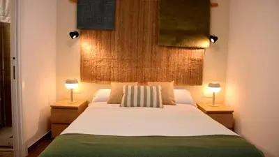 Cama o camas de una habitación en HOTEL LOS ALAMOS BOUTIQUE