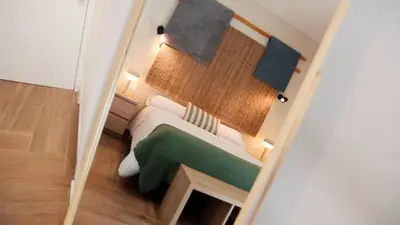 Cama o camas de una habitación en HOTEL LOS ALAMOS BOUTIQUE