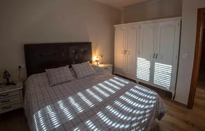 Cama o camas de una habitación en AT la abuela Antonia- Ca Pablo