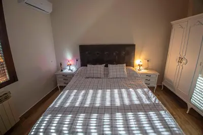 Cama o camas de una habitación en AT la abuela Antonia- Ca Pablo