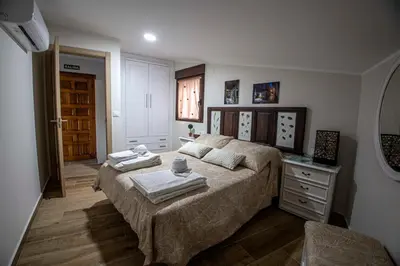 Cama o camas de una habitación en AT la Abuela Antonia-El Gurugú