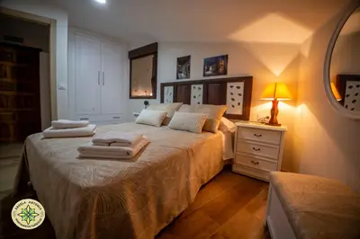 Cama o camas de una habitación en AT la Abuela Antonia-El Gurugú