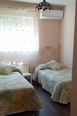 Cama o camas de una habitación en El Hogar de Pepe