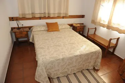 Cama o camas de una habitación en Apartamentos Rurales Monfragüe