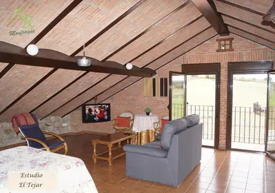 Zona de estar de Apartamentos Rurales Monfragüe
