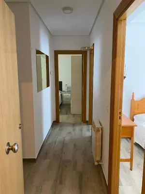 Cama o camas de una habitación en TRES COLUMNAS