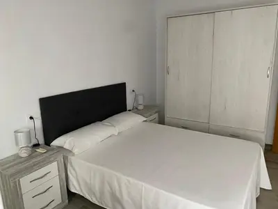 Cama o camas de una habitación en TRES COLUMNAS