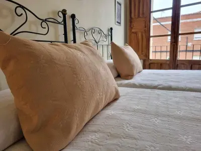Cama o camas de una habitación en Los Cuatro Caños