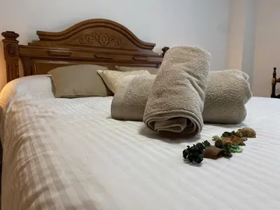 Cama o camas de una habitación en LA CASA DEL CUCO