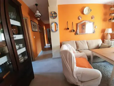 Zona de estar de El sueño de la pintora, al lado de las piscinas