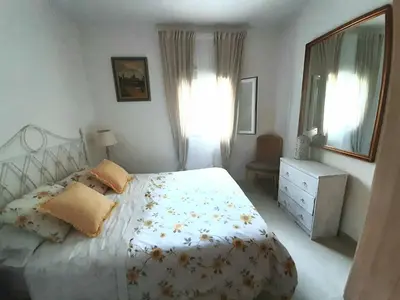 Cama o camas de una habitación en El sueño de la pintora, al lado de las piscinas