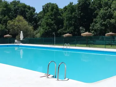 Piscina en o cerca de El sueño de la pintora, al lado de las piscinas