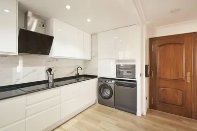 Una cocina o zona de cocina en Precioso alojamiento Barrio del Oeste