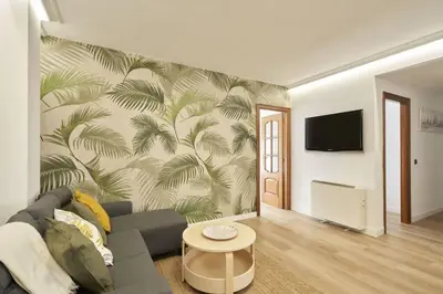 Una televisión o centro de entretenimiento en Precioso alojamiento Barrio del Oeste