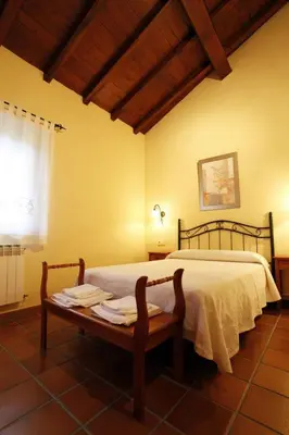 Cama o camas de una habitación en Casa Rural Puerta del Sol II de 2 habitaciones