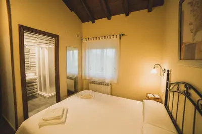 Cama o camas de una habitación en Casa Rural Puerta del Sol II de 2 habitaciones