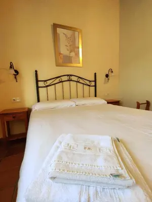 Cama o camas de una habitación en Casa Rural Puerta del Sol II de 2 habitaciones