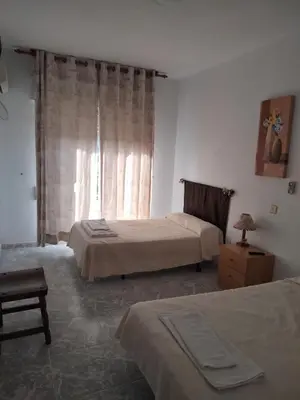 Cama o camas de una habitación en Hostal Restaurante El Labrador