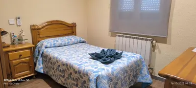 Cama o camas de una habitación en Hostal Hotel EL Chato