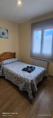 Cama o camas de una habitación en Hostal Hotel EL Chato