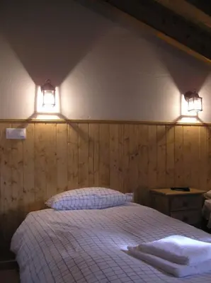 Cama o camas de una habitación en Hostal Rural Las Cuatro Calles