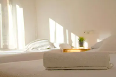 Cama o camas de una habitación en Roomin Hostel
