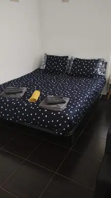 Cama o camas de una habitación en La Herradura De San Pedro