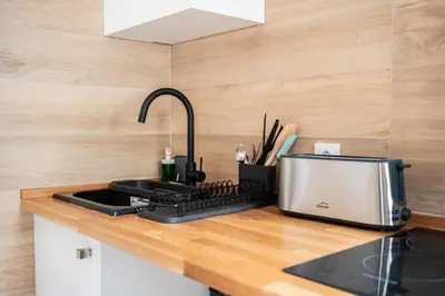 Una cocina o zona de cocina en Apartamentos GEMINA