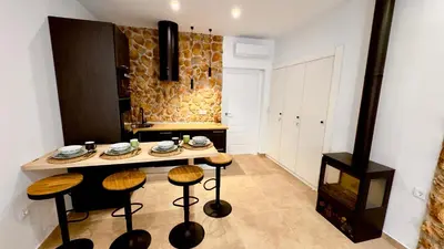 Una cocina o zona de cocina en APARTAMENTO RURAL MIRADOR DE SIERRA BERMEJA