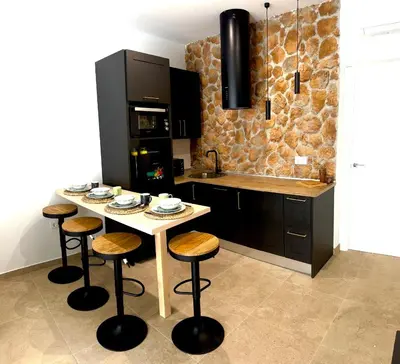 Una cocina o zona de cocina en APARTAMENTO RURAL MIRADOR DE SIERRA BERMEJA