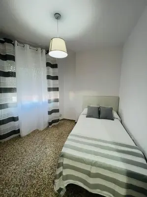 Cama o camas de una habitación en Apartamento Almazara